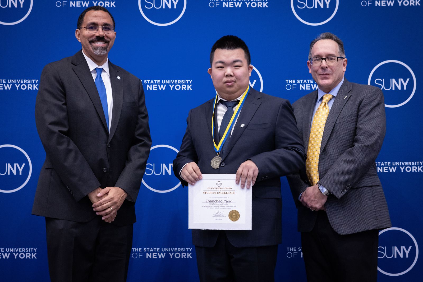 Zhanchao Yang receiving the SUNY Chancellor's Award for Student Excellence at the 2024 ceremony